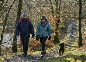 Couple walking their dog at Glentrool
