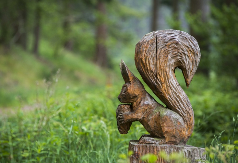 Wooden sculpture of red squirrel, Doach Wood, near Castle Douglas