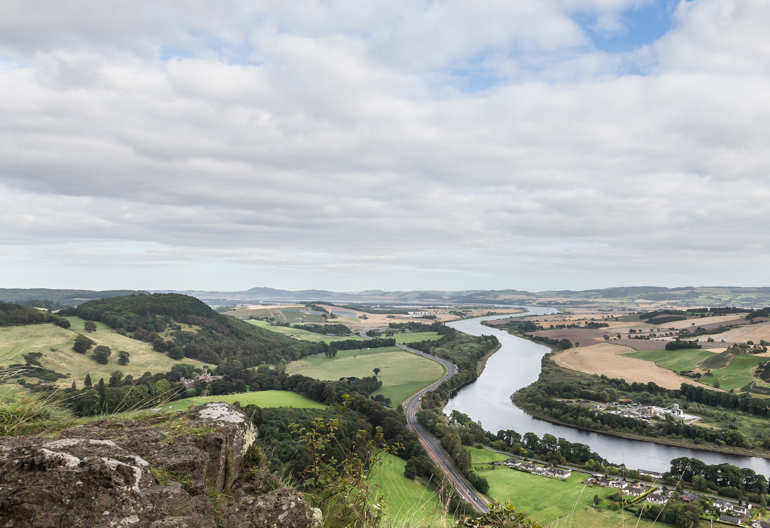 Hilltop view of the River Tay winding through fields