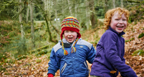 Children laughing in forest