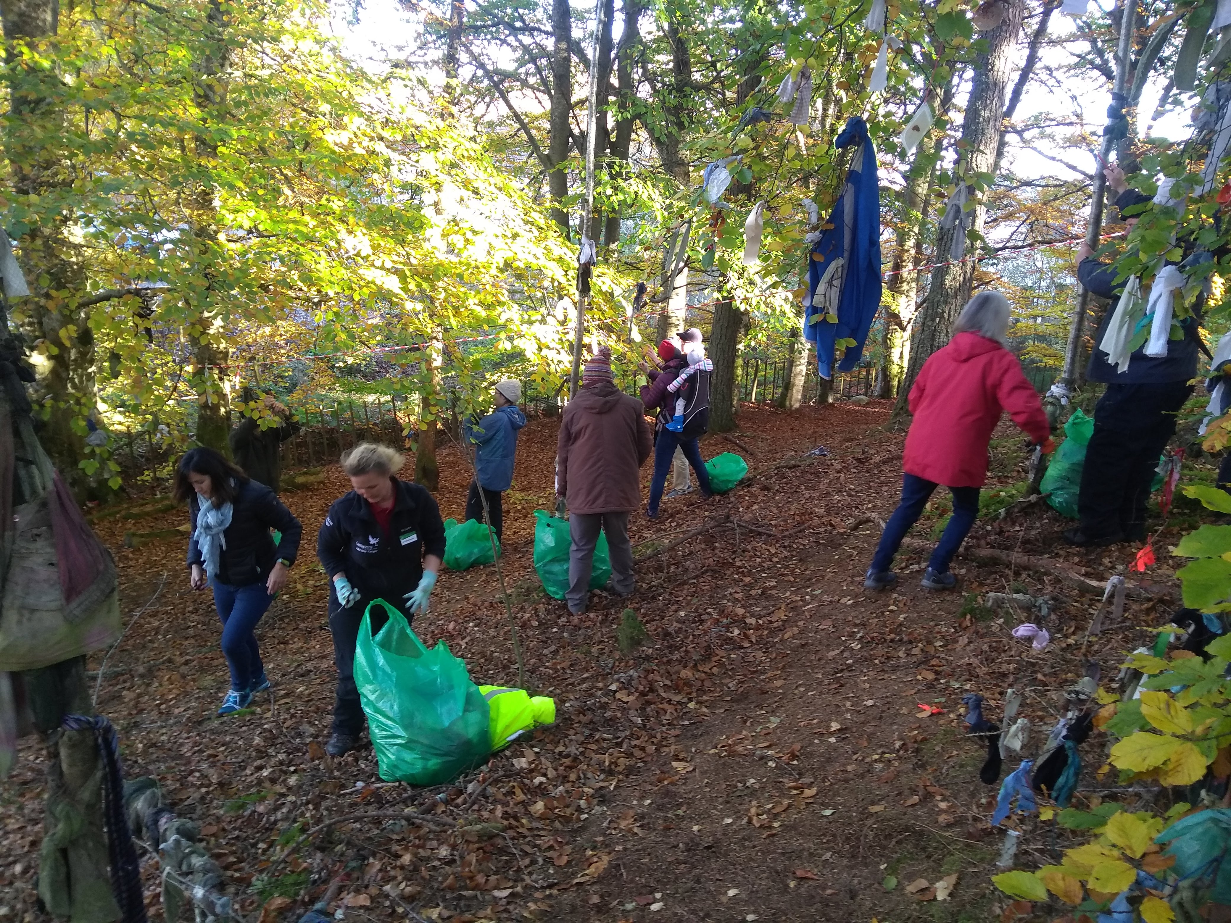 Volunteers hard at work cleaning up the clootie well