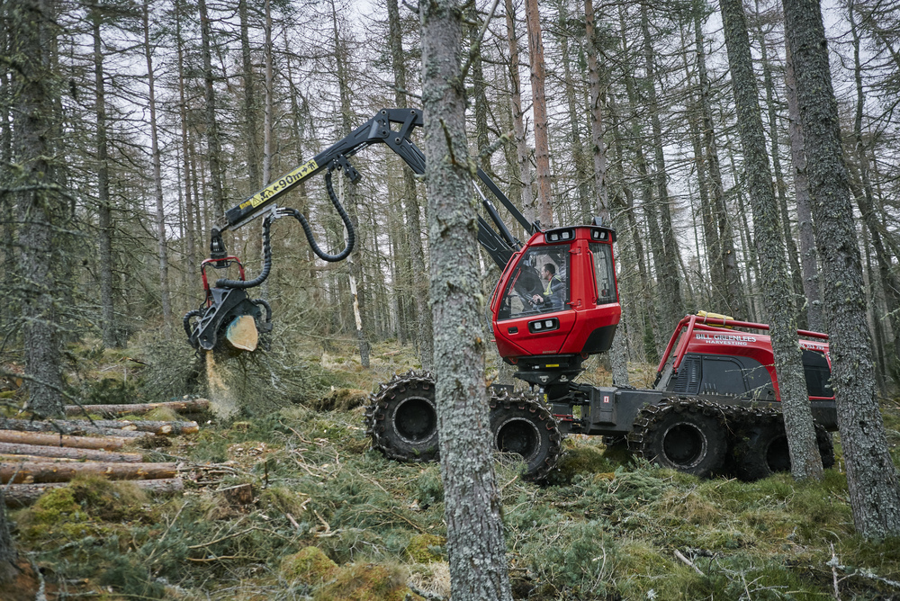 Harvesting machine operating in dense forest