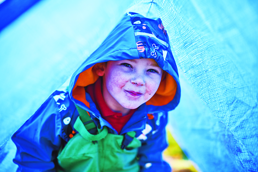 Young boy in tent