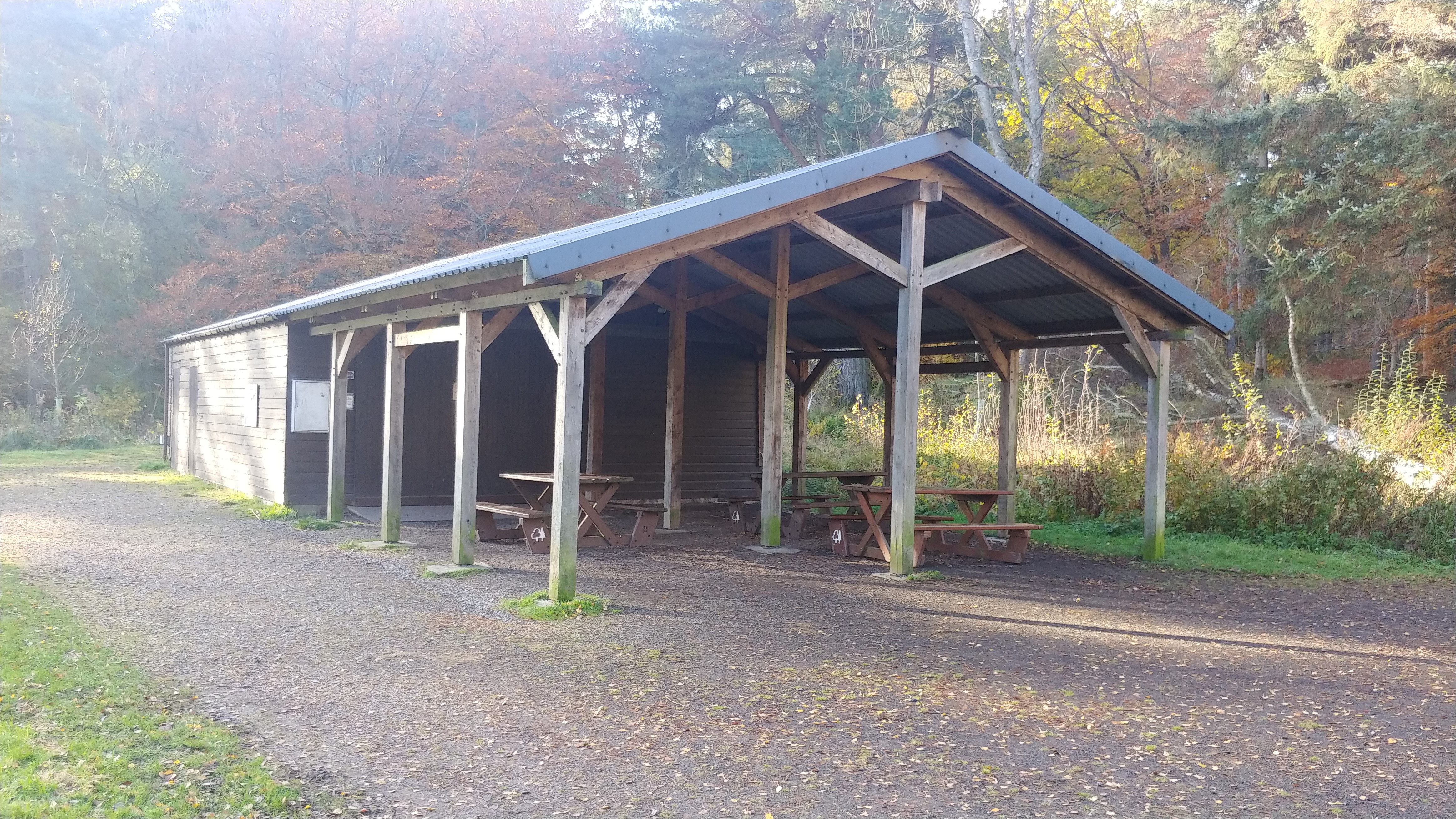 Exterior of the Kinnoull shed, showing a covered outdoor area with attractive timber beams