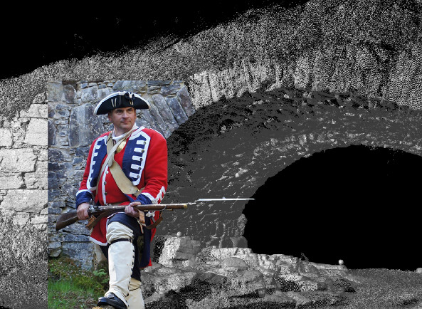 Man in Napoleonic style military uniform with gun and hat standing before a super-imposed digital stone bridge