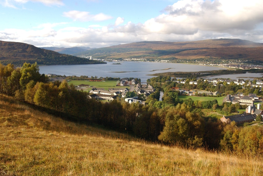 A hilltop view overlooking Fort William town and the loch beyond
