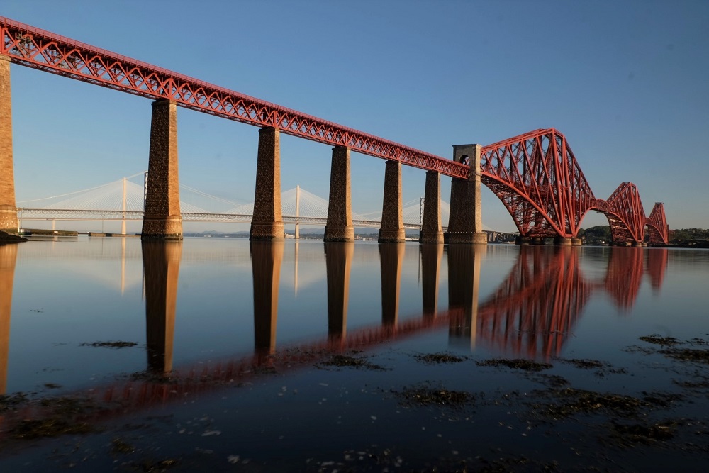 The red, cantilever Forth Rail Bridge over the Firth of Forth