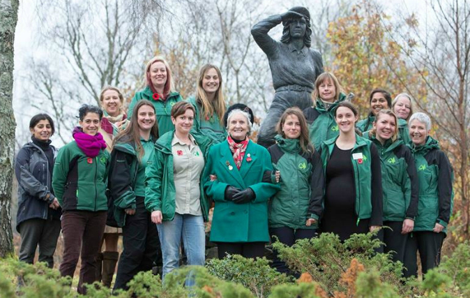 A group of todays female foresters pose with Lumberjill Christina Forrester in Aberfoyle.
