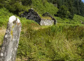 A standing stone and ruined cottage at Knapdale