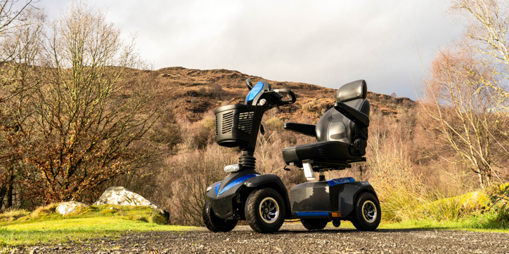 A mobility scooter on a forest path