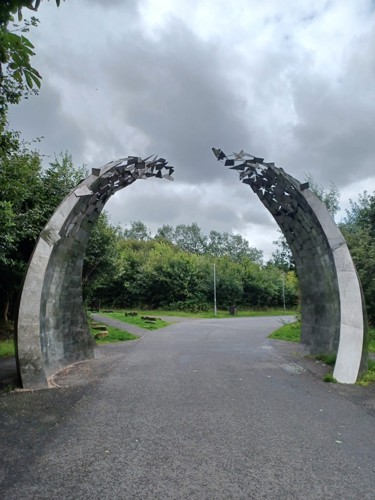 Path going through arch sculptures.